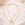 Two gold necklaces on a soft beige background